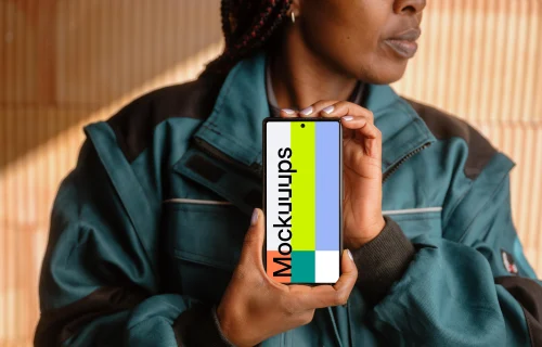 Female architect with a smartphone mockup