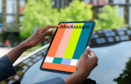 Female entrepreneur holding an iPad Air mockup