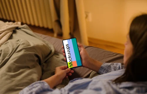 Female hand holding a phone mockup