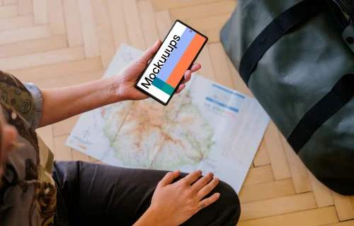 Female hand holding a phone mockup