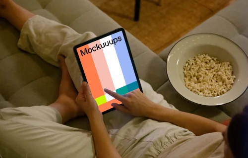 Female hand typing on an iPad Air mockup