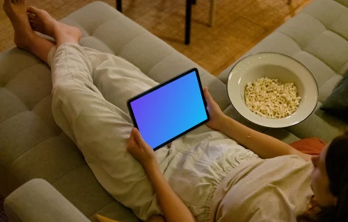 Female hands holding an iPad Air mockup