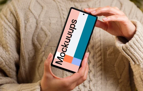 Female holding a phone mockup in Christmas theme