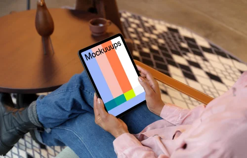 Female holding a tablet mockup