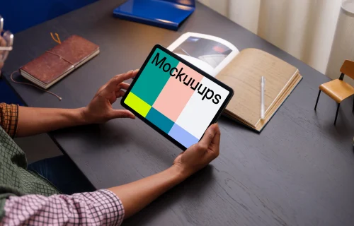 Female holding an iPad Air mockup