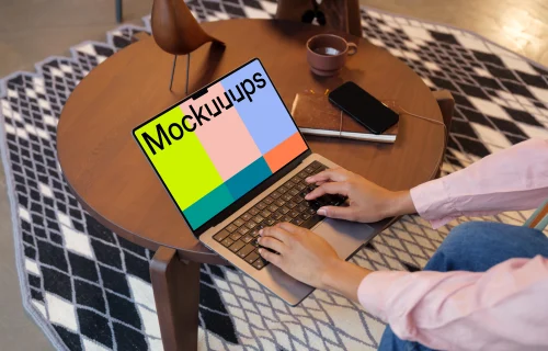 Female typing on a MacBook Pro 14 mockup