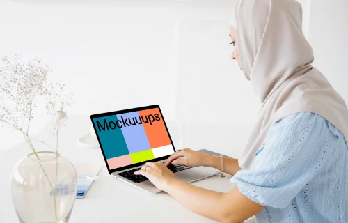 Female user typing on a Laptop mockup