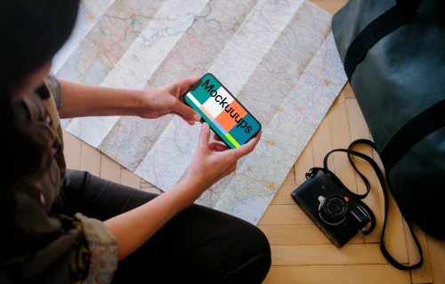 Female working on an iPhone 13 mockup