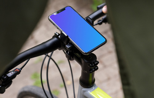 Front view of iPhone 11 Pro mockup in bike mount while riding