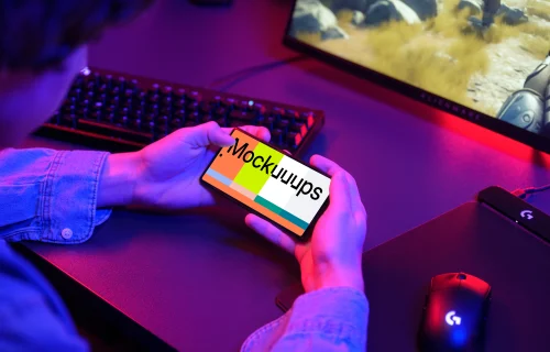 Gaming smartphone mockup in a gamer setup