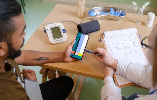 Google Pixel 6 mockup in the patient’s hand