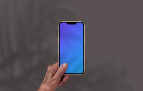 Hand holding smartphone mockup