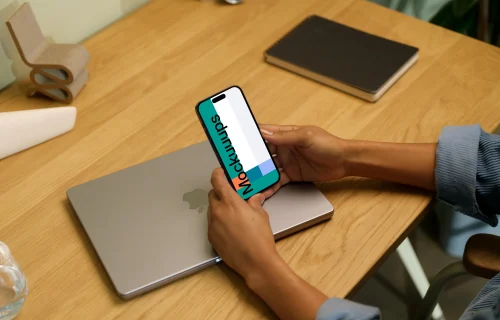 Hands holding an iPhone 14 Pro mockup