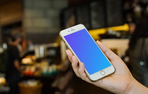 Holding iPhone 6 Gold mockup