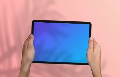 Holding tablet mockup on the gradient background