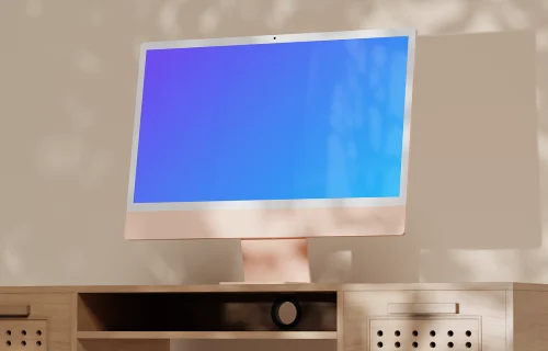 iMac mockup on a light wooden desk with soft shadows