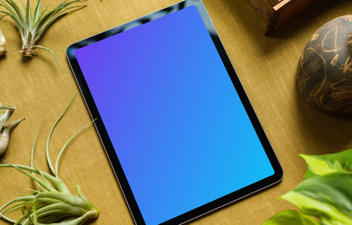 iPad Air mockup on a table with vegetables at the side