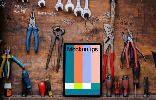 iPad Air mockup placed next to some work tools