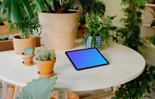 iPad mockup on a roundtable in a garden