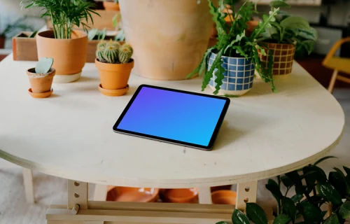 iPad mockup on a white round table