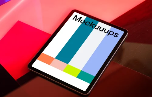 iPad mockup with red background