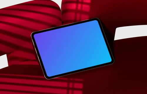 iPad Pro mockup on a bold red background