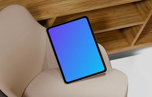 iPad Pro mockup on a modern beige chair