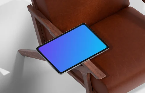 iPad Pro mockup on a modern leather chair