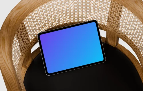 iPad Pro mockup on a modern wooden chair