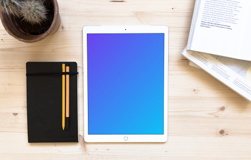 iPad Pro mockup on the wooden desk