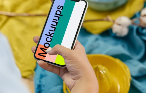 iPhone 12 Pro mockup held by user