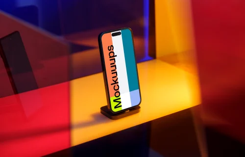 iPhone 14 Pro mockup standing on a yellow pad