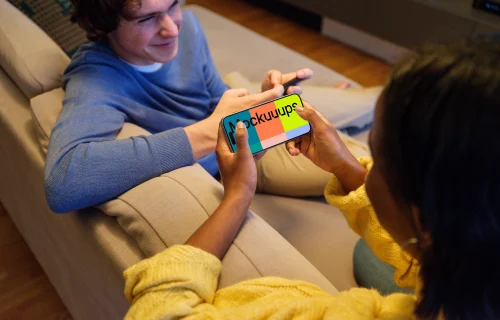 iPhone 15 Pro mockup in Hand for Gaming Concept