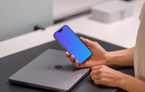 iPhone 15 Pro mockup with a professional workspace