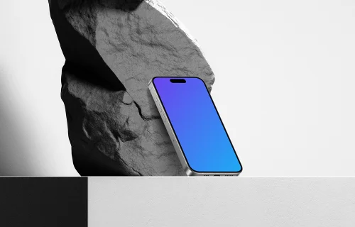 iPhone 15 Pro on Rock Mockup