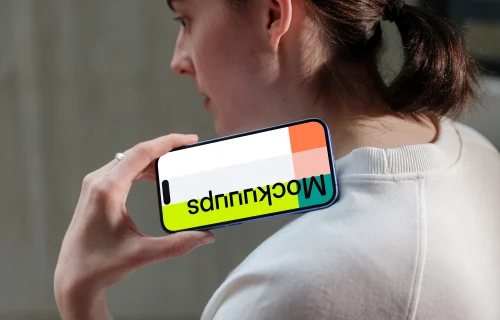 iPhone 16 mockup held in hand