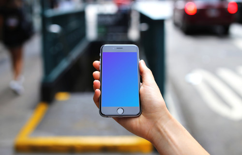 iPhone 6s mockup in front of Underground Entrance