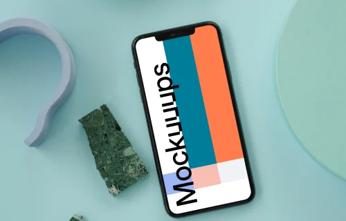 iPhone mockup on a blue table