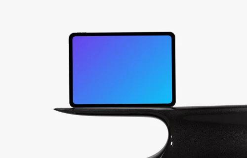 Landscape iPad Pro mockup on a curved black surface