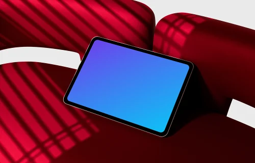 Landscape iPad Pro mockup on a red modern chair