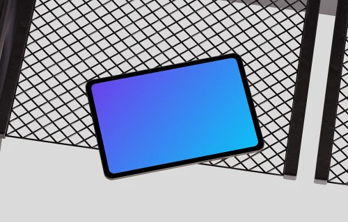 Landscape iPad Pro mockup on geometric metal surface