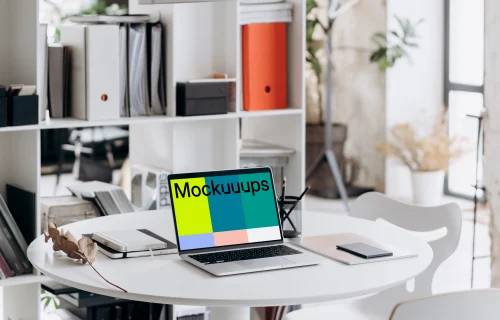 Laptop mockup in an office setting
