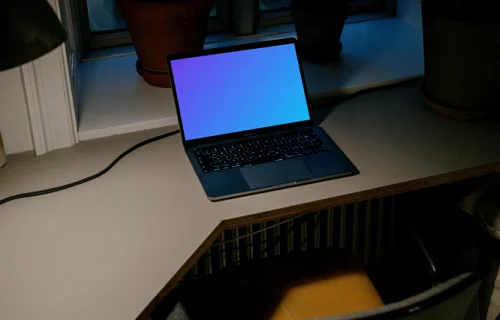 Laptop mockup on a white table