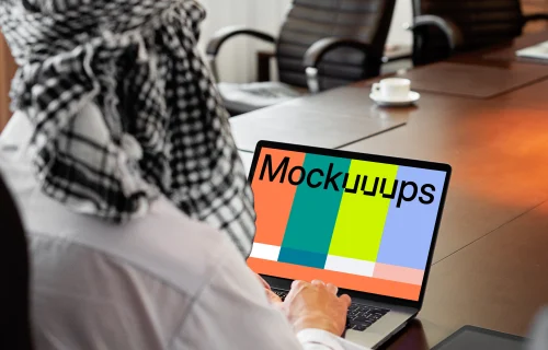 MacBook Air mockup used by a lady with a head covering