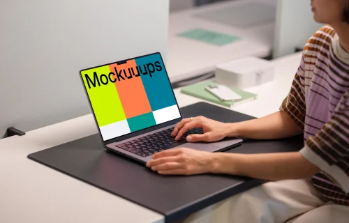 MacBook Pro 14 mockup with female professional in office setting