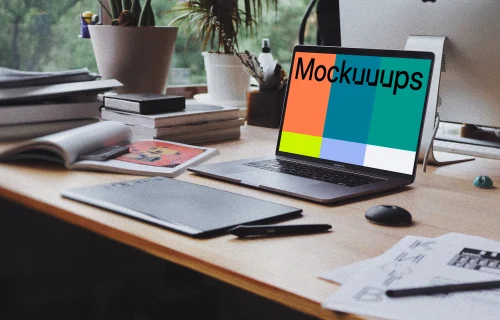 MacBook Pro mockup in front of a notepad