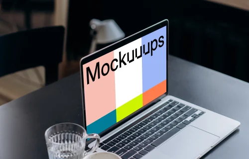 MacBook Pro mockup on a black table