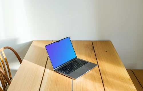 MacBook Pro mockup on a dining table against a white background