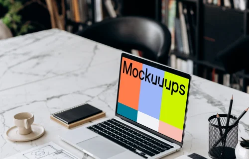 MacBook Pro mockup on a marble work table