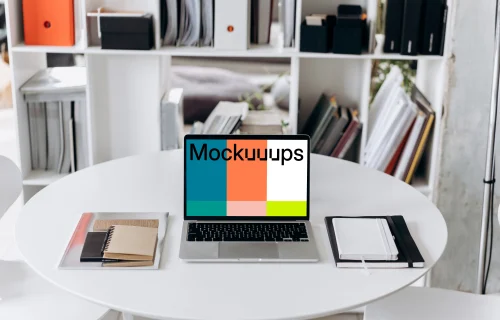MacBook Pro mockup on a white round table